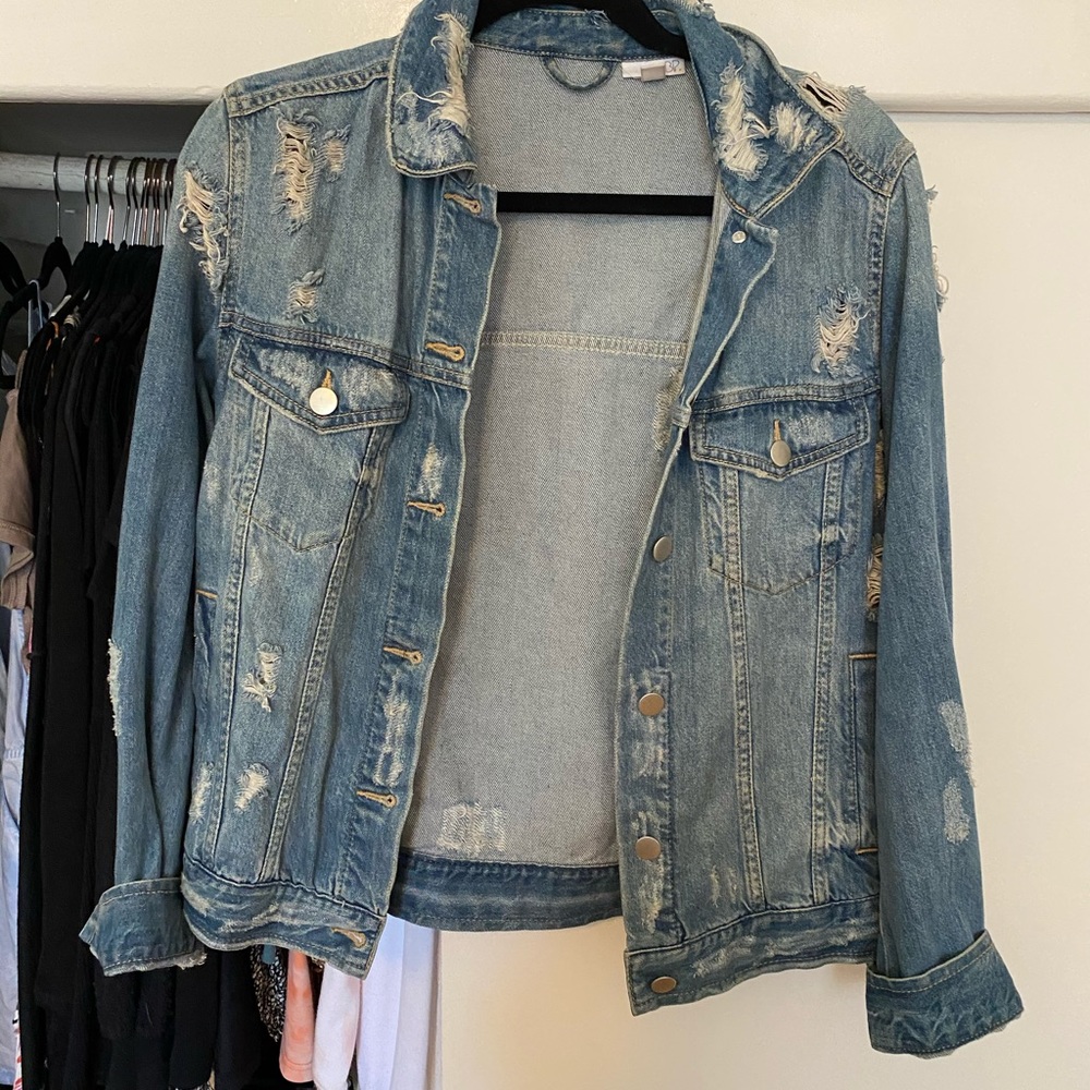 Distressed denim jacket